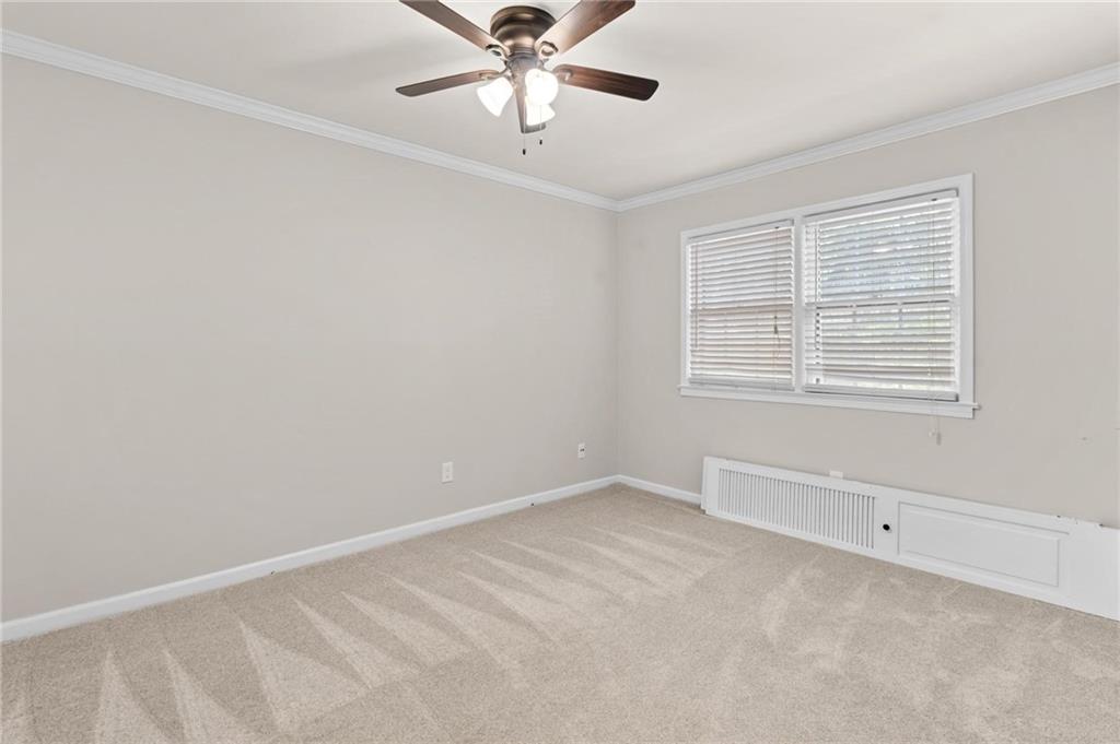 34 Chaumont Square Northwest Atlanta, GA 30327 - Photo 29 of 42 a view of an empty room with a window