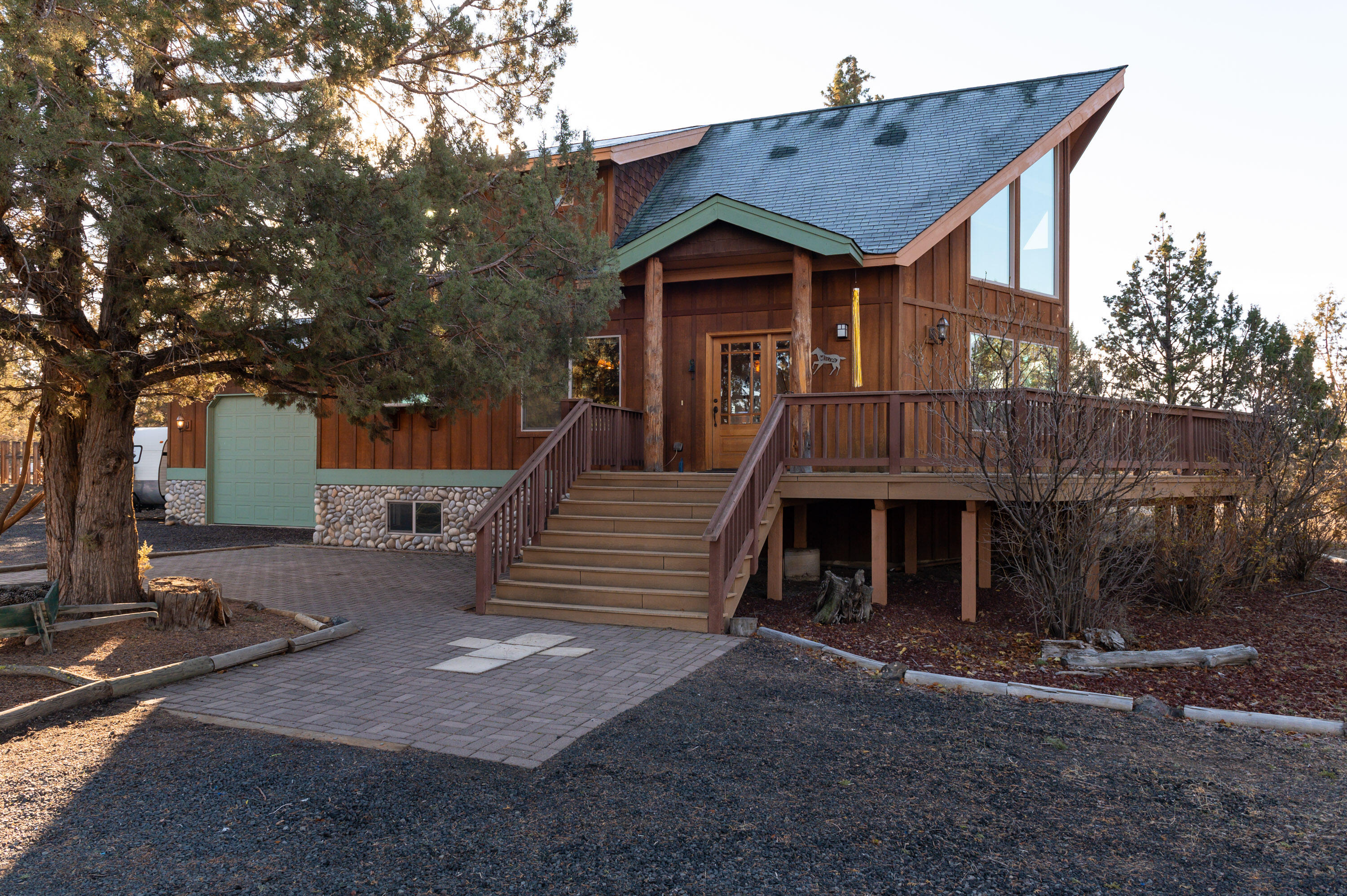 66828 Lance Road Bend, OR 97703 - Photo 2 of 45 a front view of a house with a yard