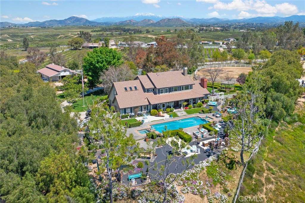 39817 Calle Cabernet Temecula, CA 92591 - Photo 12 of 75 a aerial view of a house with a lake view