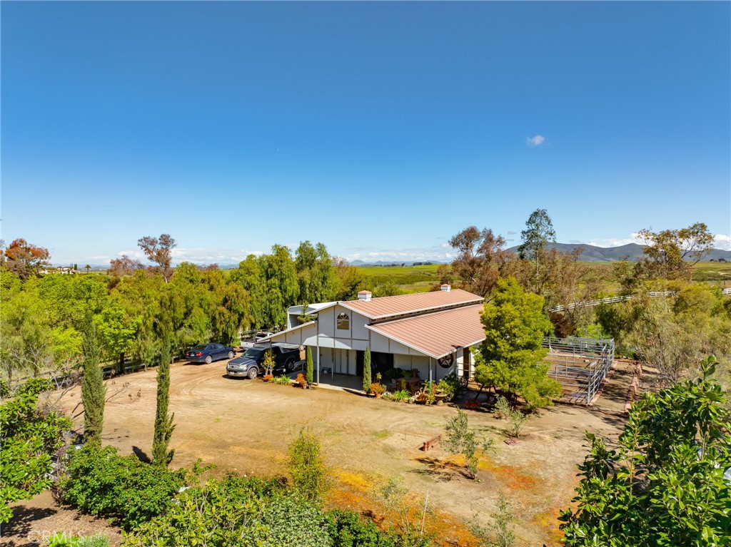 39817 Calle Cabernet Temecula, CA 92591 - Photo 13 of 75 a view of a house with a yard and sitting area