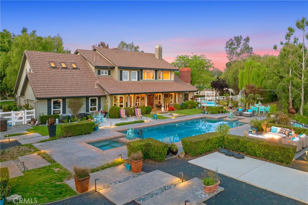 39817 Calle Cabernet Temecula, CA 92591 - Photo 4 of 75 an aerial view of a house with swimming pool garden and patio