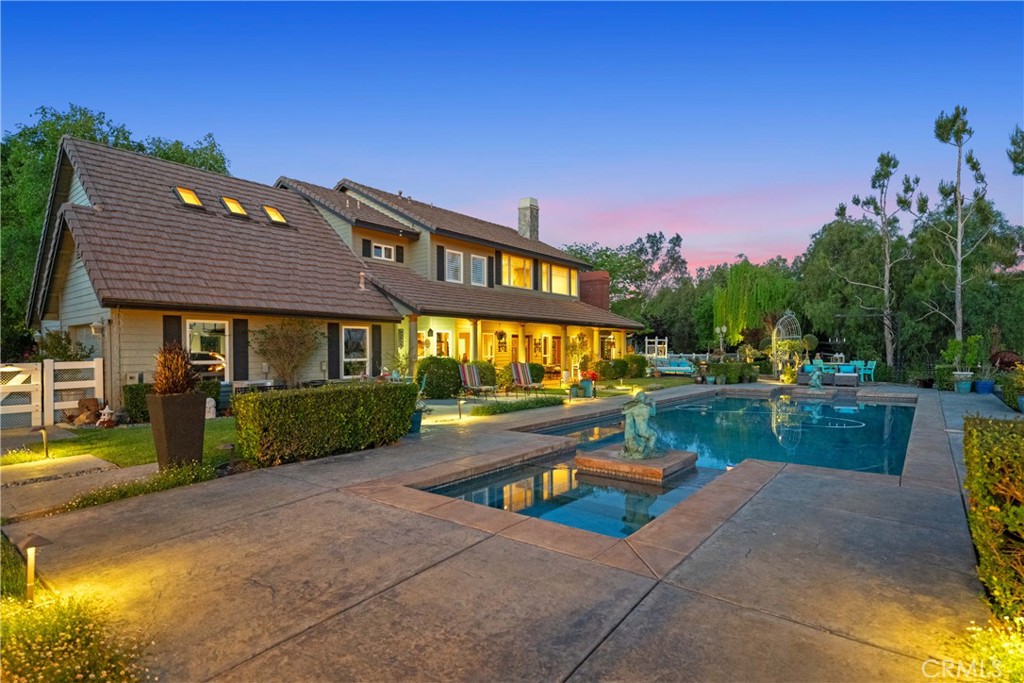 39817 Calle Cabernet Temecula, CA 92591 - Photo 8 of 75 a view of a house with swimming pool and sitting area