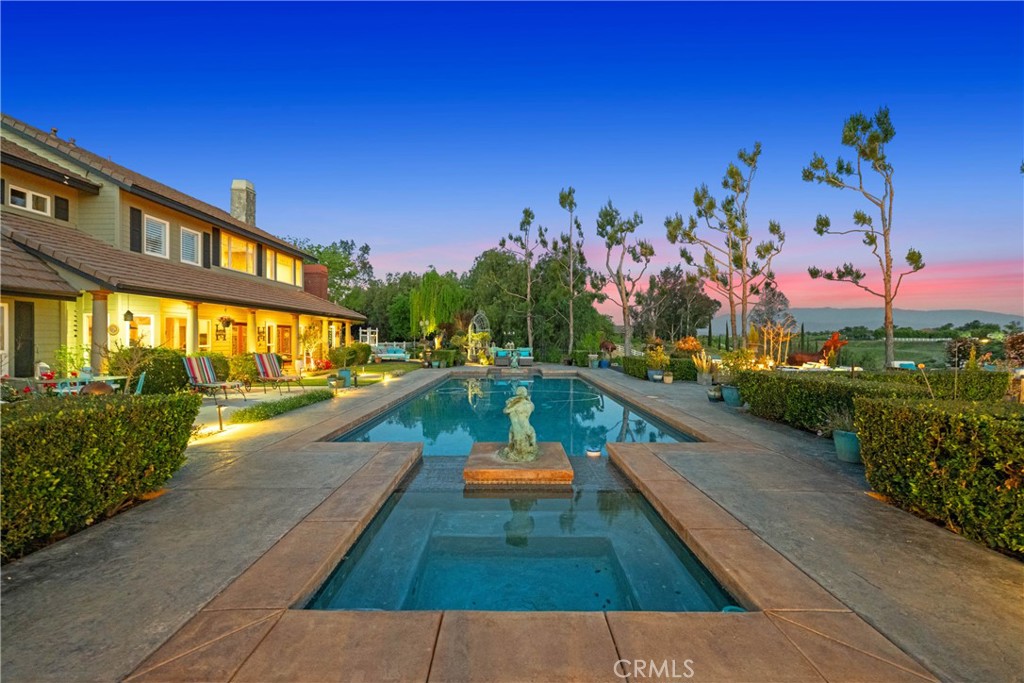 39817 Calle Cabernet Temecula, CA 92591 - Photo 9 of 75 a view of swimming pool with a patio