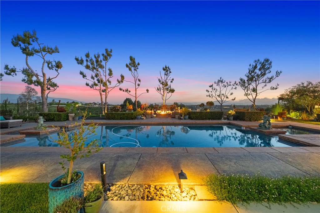 39817 Calle Cabernet Temecula, CA 92591 - Photo 10 of 75 a view of swimming pool with a patio and a yard