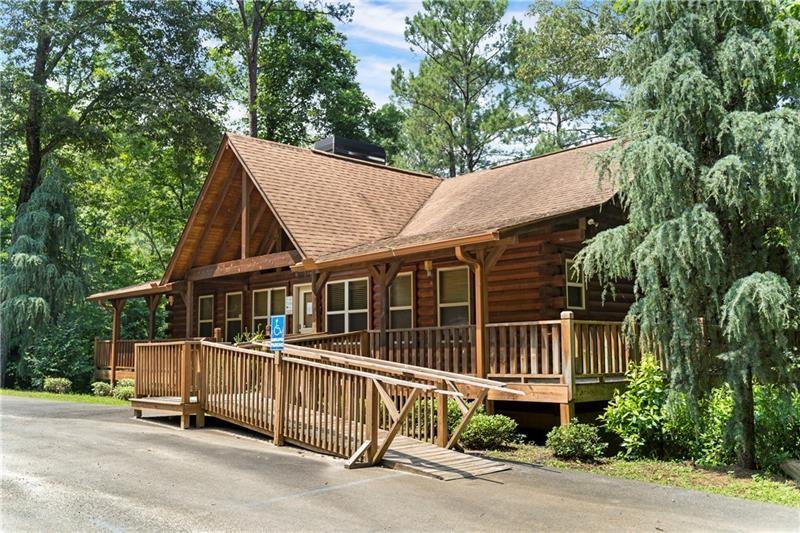 363 Luna Court Northeast Ranger, GA 30734 - Photo 30 of 39 a view of a house with a yard and plants
