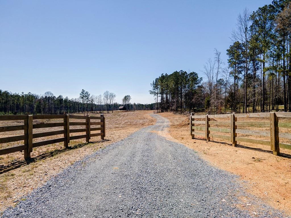 0 Corinth Road Calhoun, GA 30701 - Photo 1 of 1 a view of a pathway with a yard