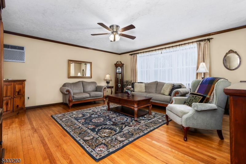 9 Wehrli Road Long Valley, NJ 07853 - Photo 11 of 35 a living room with furniture and a rug