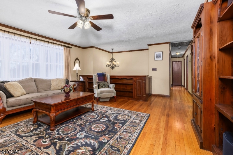 9 Wehrli Road Long Valley, NJ 07853 - Photo 13 of 35 a living room with furniture and a rug