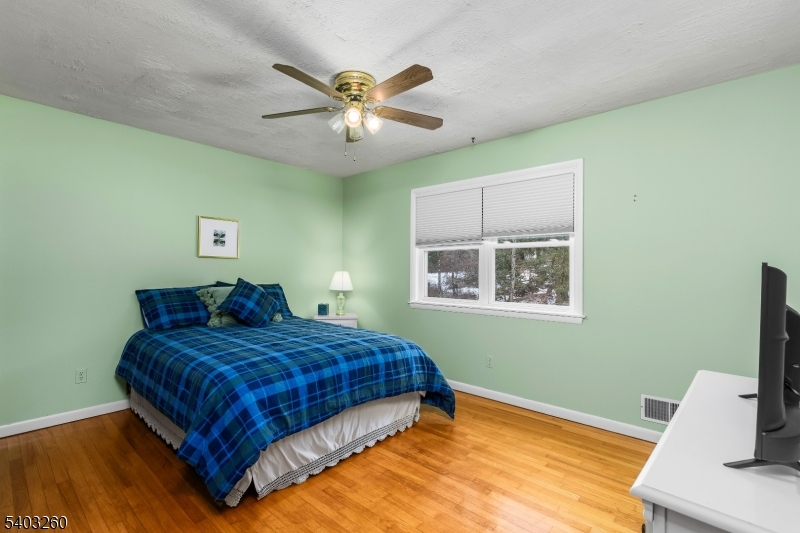 9 Wehrli Road Long Valley, NJ 07853 - Photo 15 of 35 a bedroom with a bed and a window