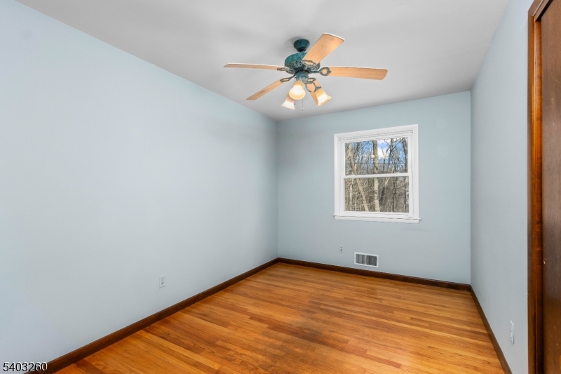 9 Wehrli Road Long Valley, NJ 07853 - Photo 19 of 35 wooden floor in an empty room with a window