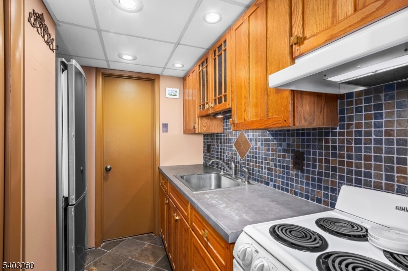 9 Wehrli Road Long Valley, NJ 07853 - Photo 22 of 35 a bathroom with a sink a toilet and shower