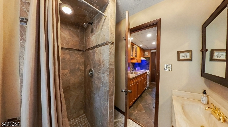 9 Wehrli Road Long Valley, NJ 07853 - Photo 24 of 35 a bathroom with a shower and a sink
