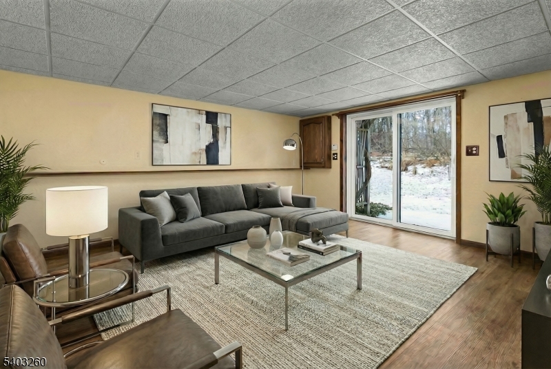 9 Wehrli Road Long Valley, NJ 07853 - Photo 26 of 35 a living room with furniture and wooden floor