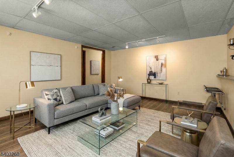 9 Wehrli Road Long Valley, NJ 07853 - Photo 28 of 35 a living room with furniture and a table