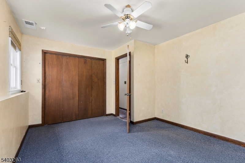 9 Wehrli Road Long Valley, NJ 07853 - Photo 31 of 35 a view of an empty room with a ceiling fan