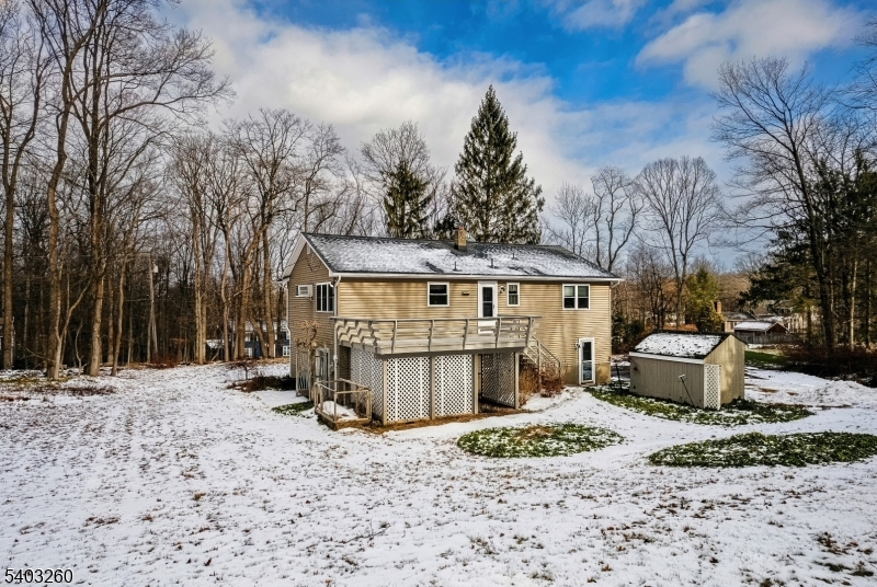 9 Wehrli Road Long Valley, NJ 07853 - Photo 34 of 35 a view of a house with a yard covered in snow