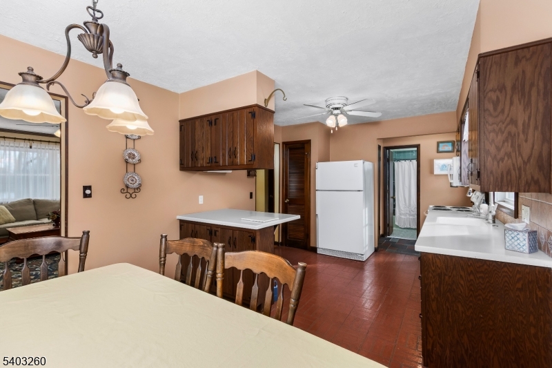 9 Wehrli Road Long Valley, NJ 07853 - Photo 7 of 35 a spacious bedroom with a bed a desk and chair