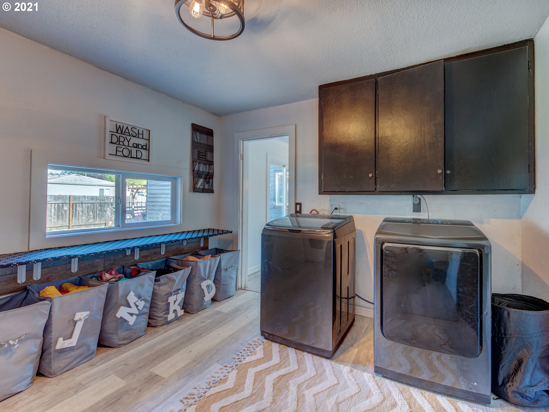 580 54th Street Springfield, OR 97478 - Photo 13 of 31 a kitchen with refrigerator and window