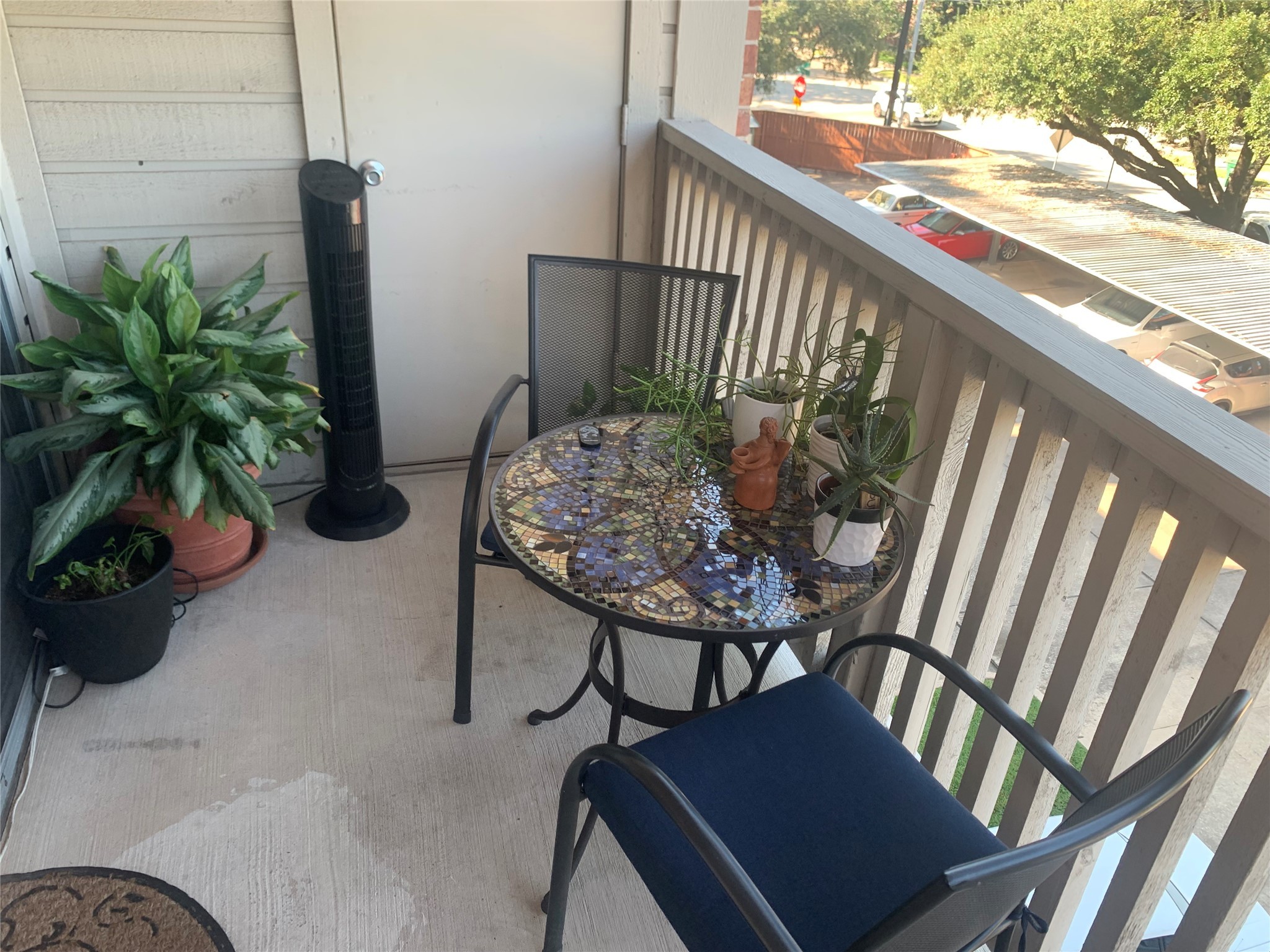 4041 Drake Street, Unit 118 Houston, TX 77005 - Photo 21 of 28 a view of a porch with furniture and a potted plant