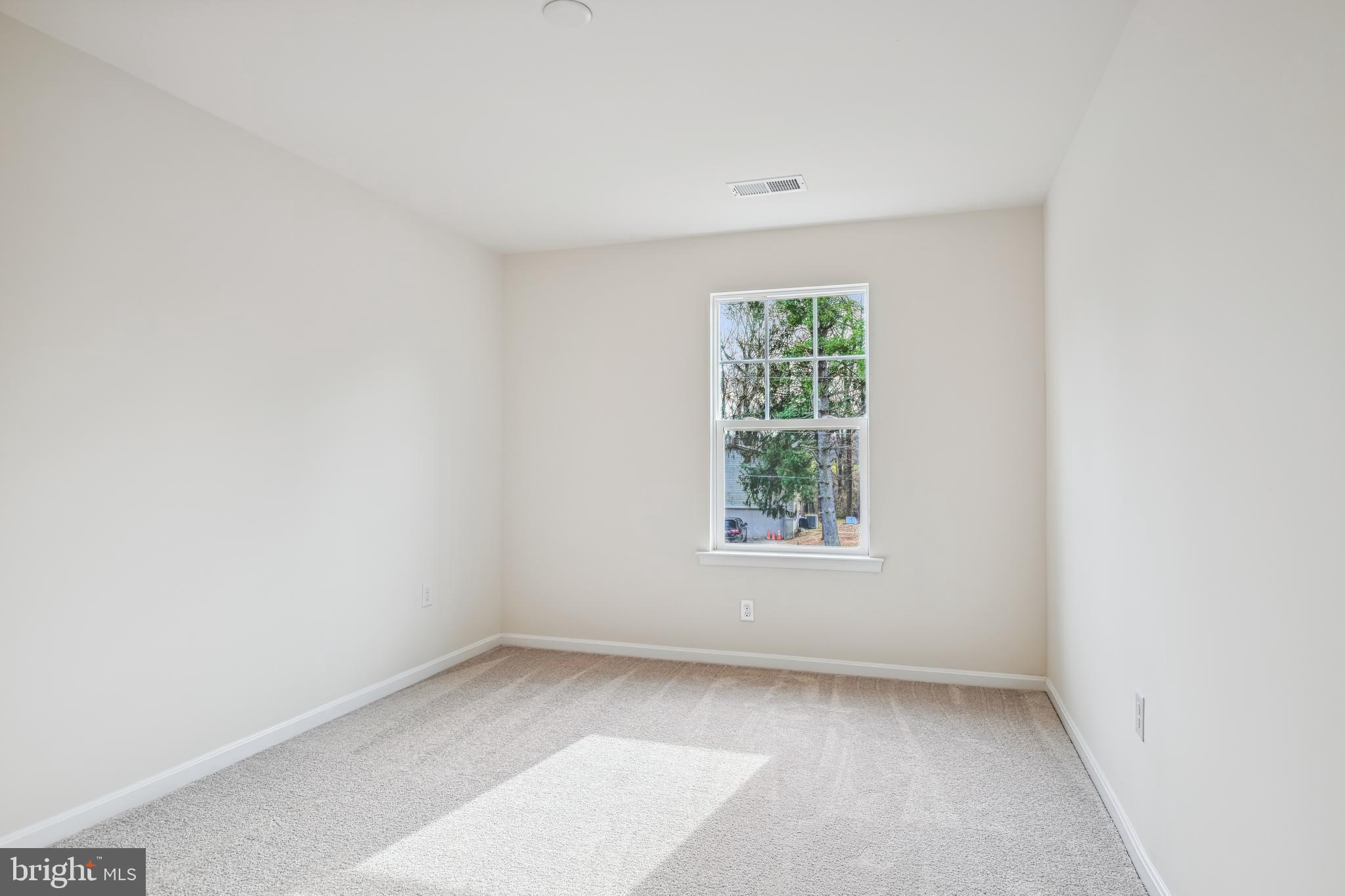 11235 Lord Baltimore Drive Issue, MD 20645 - Photo 12 of 23 an empty room with a window