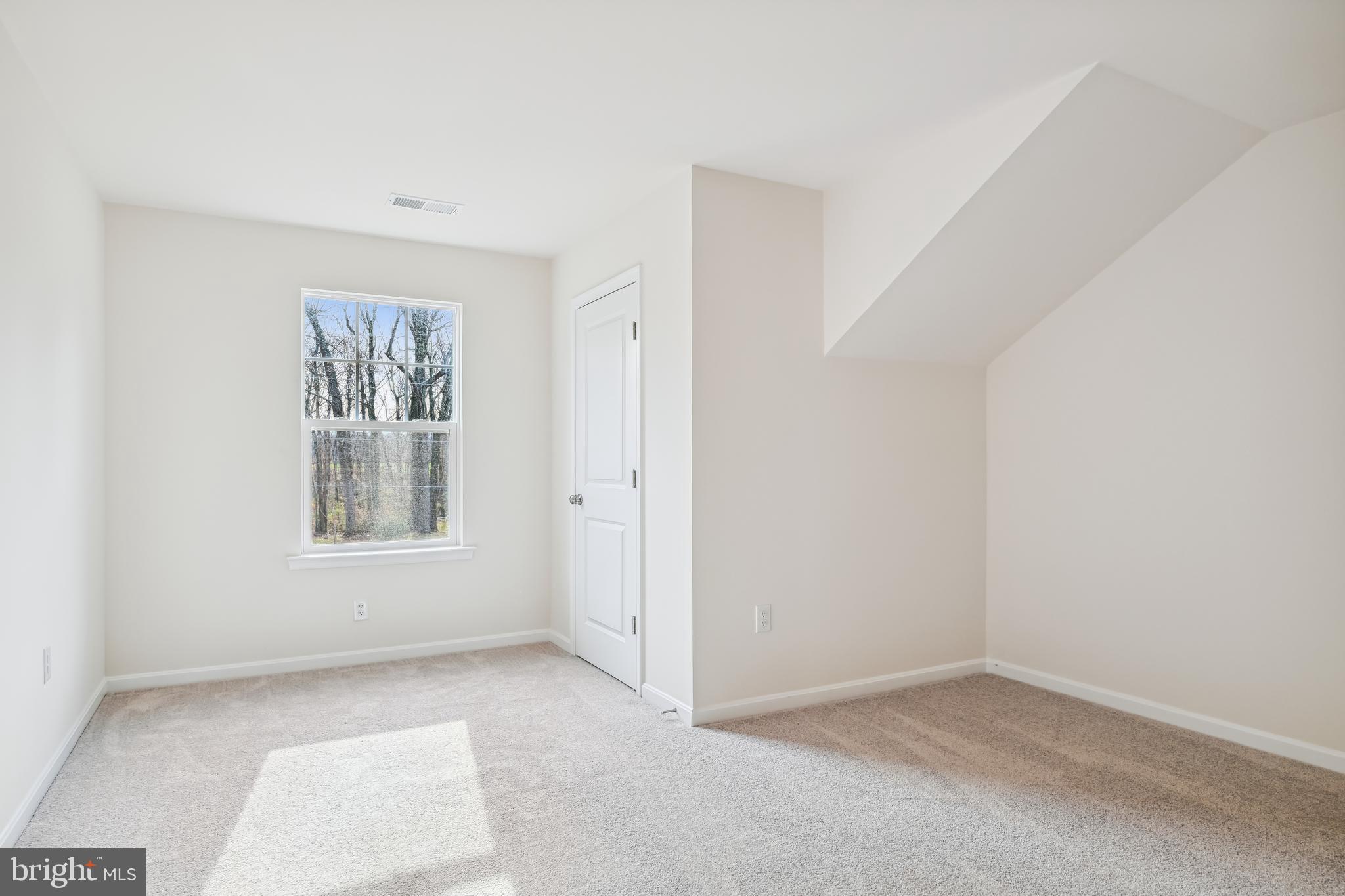 11235 Lord Baltimore Drive Issue, MD 20645 - Photo 14 of 23 an empty room with windows