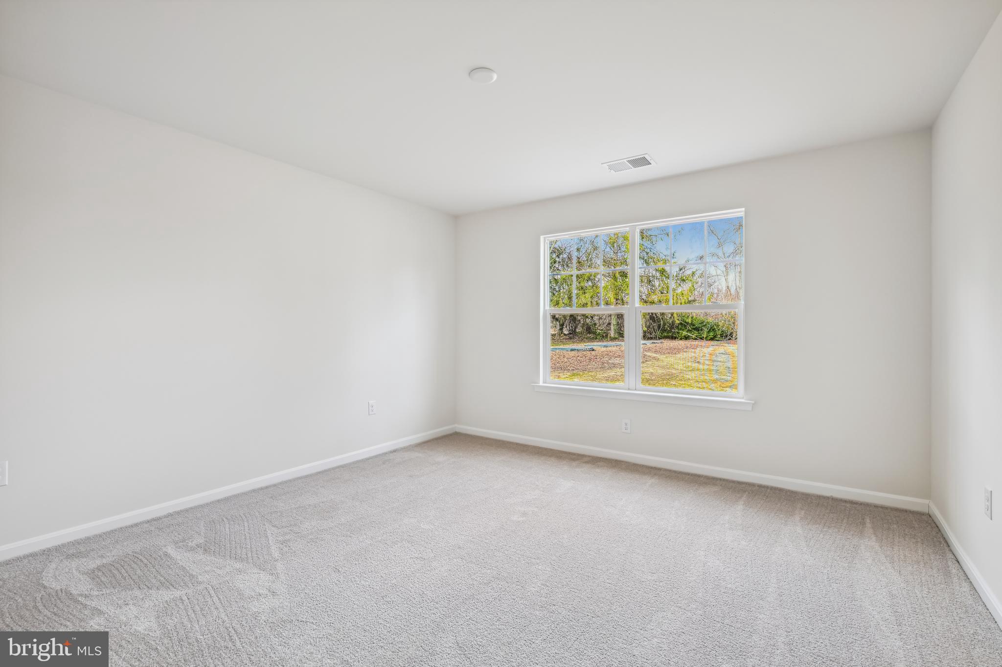 11235 Lord Baltimore Drive Issue, MD 20645 - Photo 18 of 23 an empty room with windows