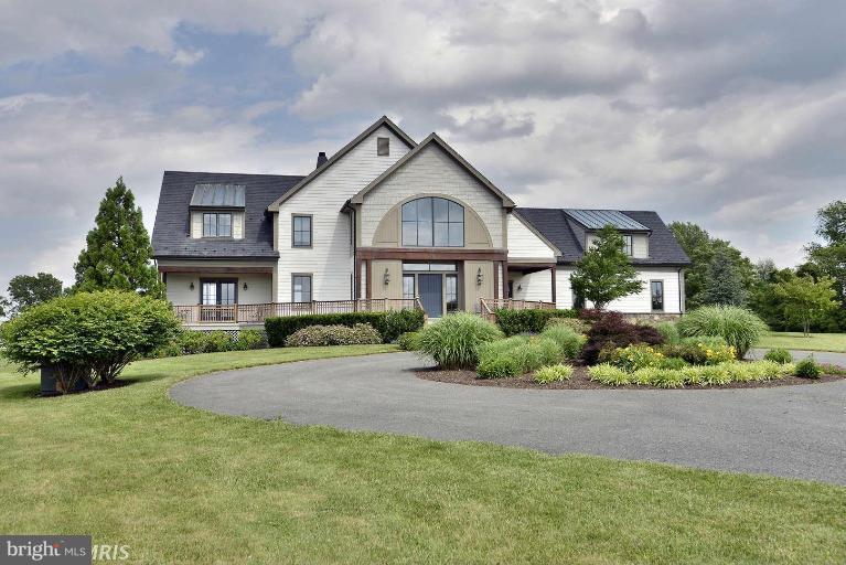 14527 Partnership Road Poolesville, MD 20837 - Photo 2 of 30 a front view of a house with a yard
