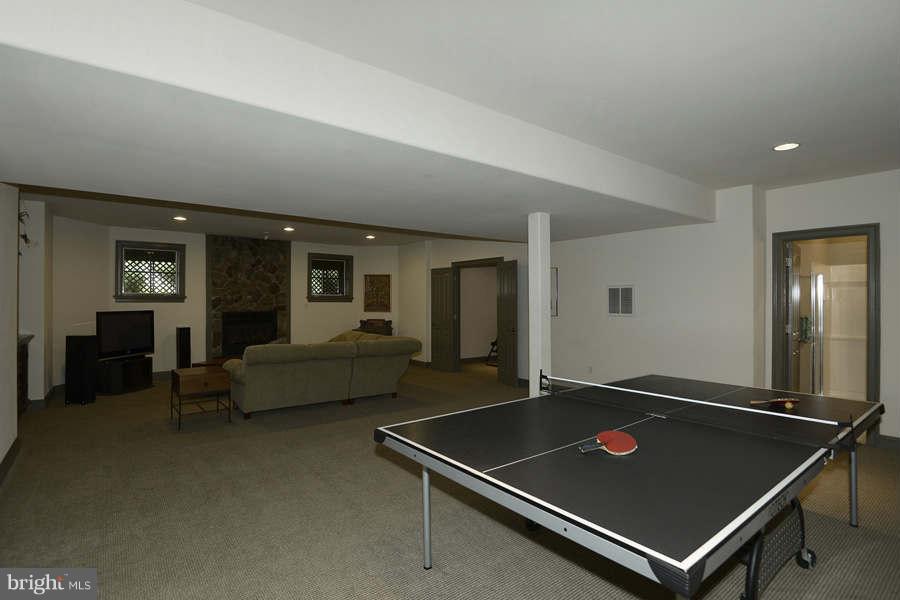 14527 Partnership Road Poolesville, MD 20837 - Photo 27 of 30 a living room with furniture pool table and windows