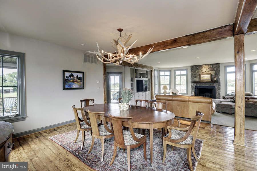 14527 Partnership Road Poolesville, MD 20837 - Photo 10 of 30 a view of a dining room with furniture and wooden floor