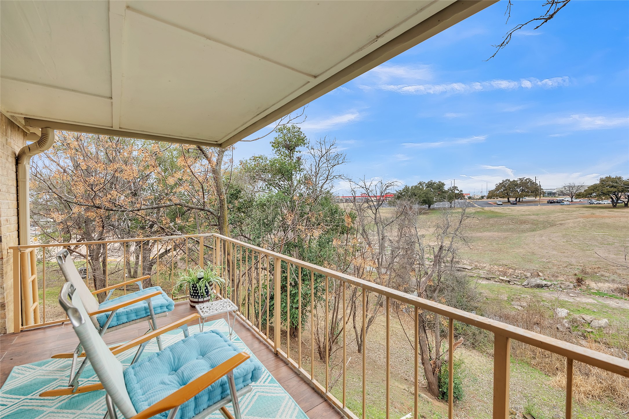 1201 Ranch Road 1431, Unit 8 Marble Falls, TX 78654 - Photo 1 of 24 Views of wooded draw - seasonal creek.