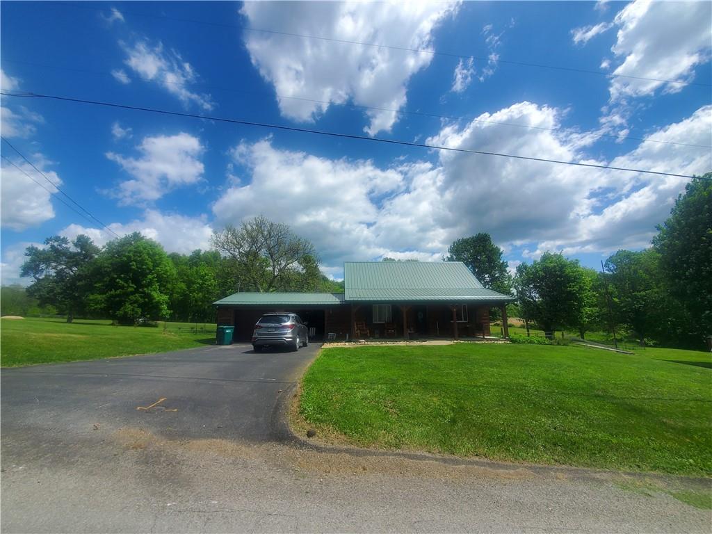 132 Laird's Crossing Road Worthington, PA 16262 - Photo 5 of 20 a view of a yard in front of the house