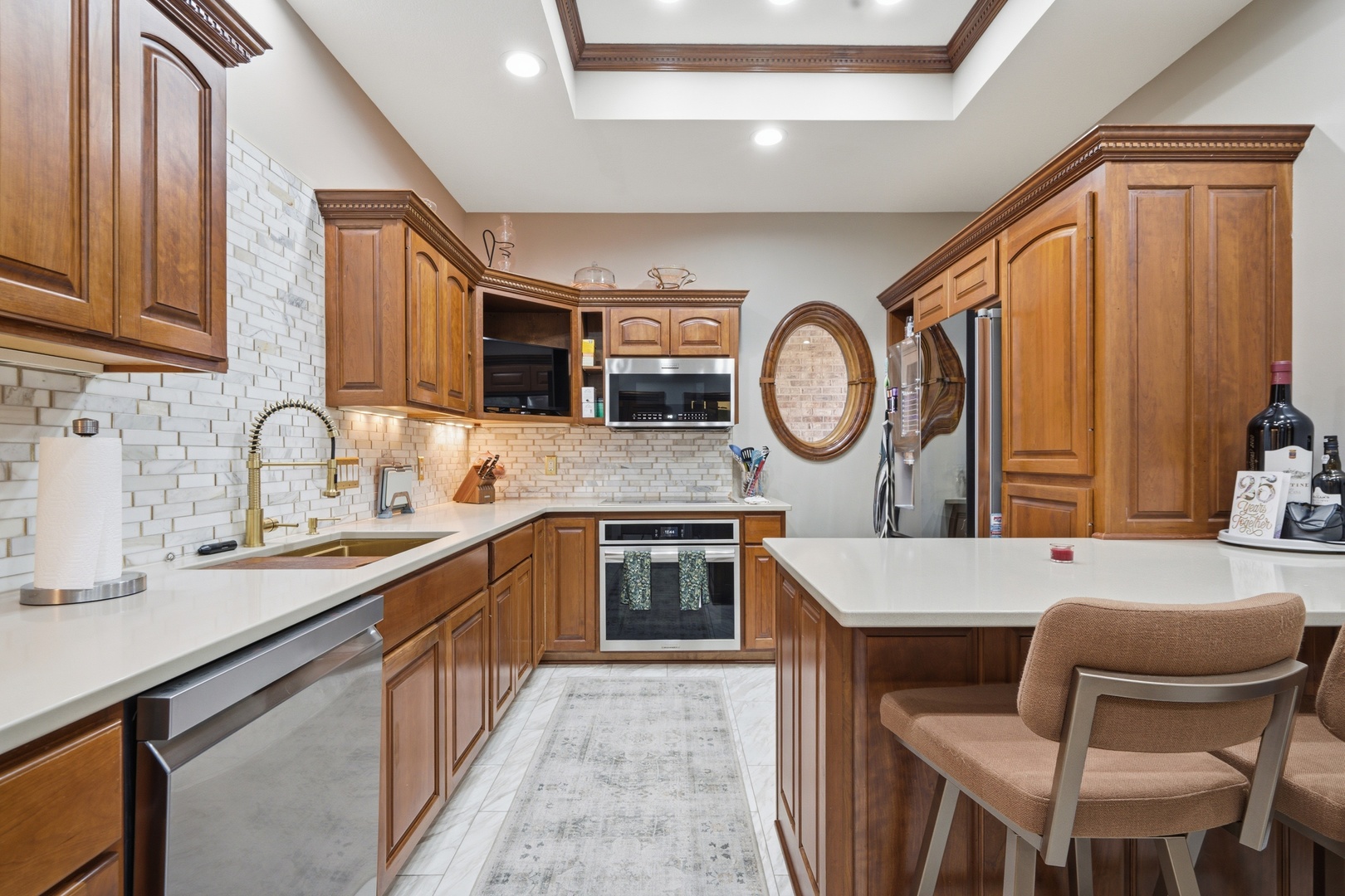 1009 Melody Hills Fulton, IL 61252 - Photo 11 of 51 a kitchen with a table chairs sink and cabinets