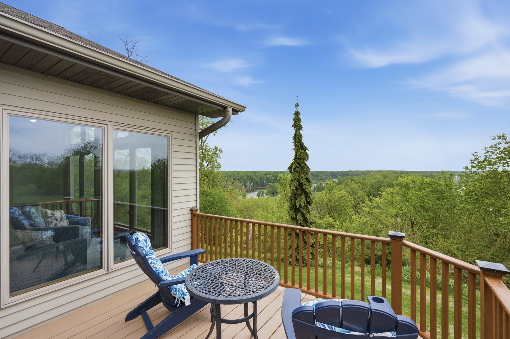 1009 Melody Hills Fulton, IL 61252 - Photo 24 of 51 a view of a chair and table in the balcony