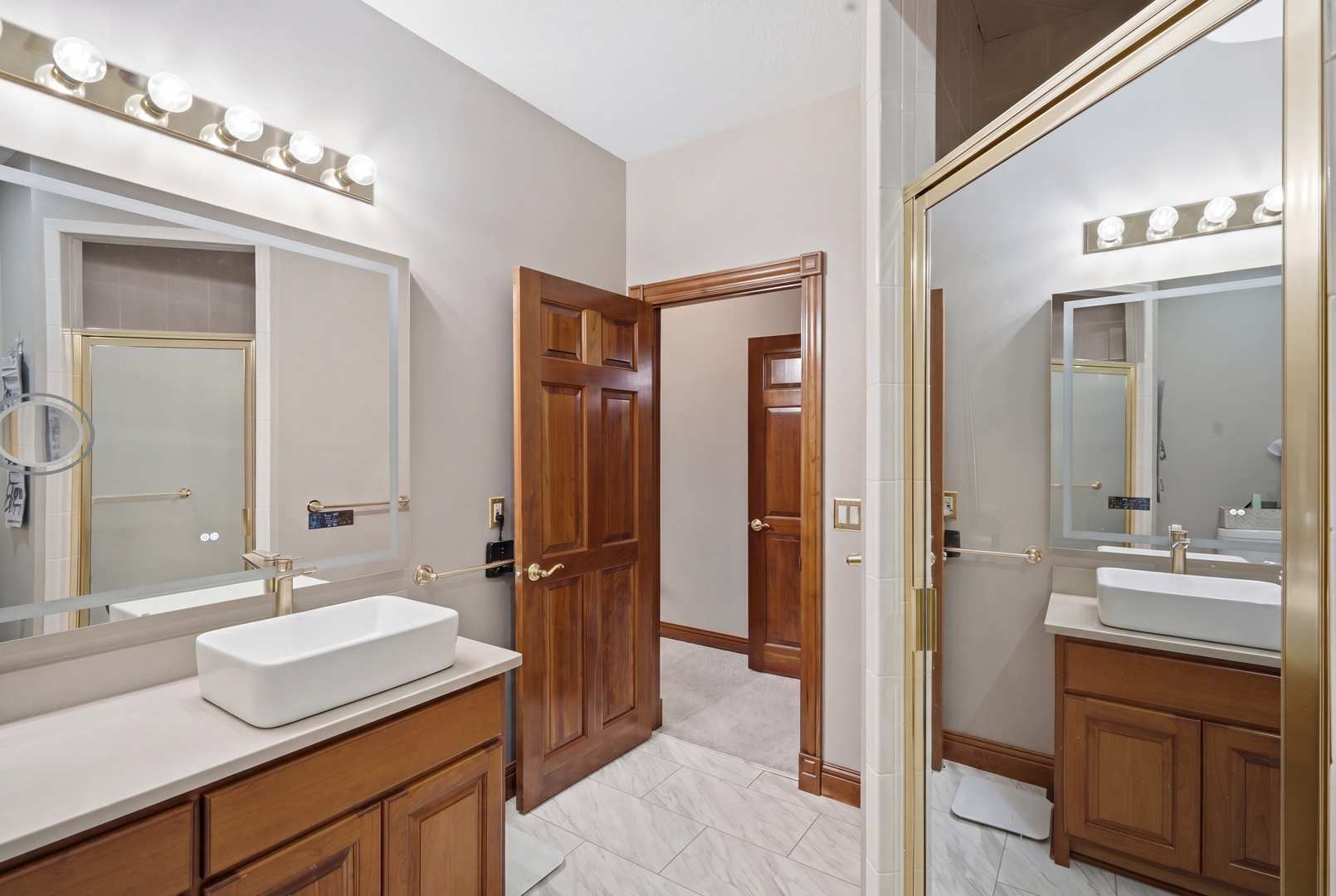 1009 Melody Hills Fulton, IL 61252 - Photo 32 of 51 a bathroom with a sink double vanity and a mirror