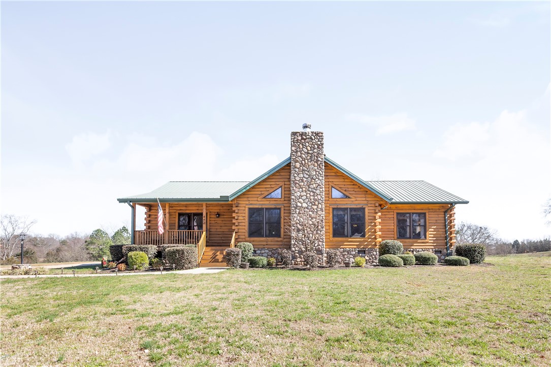 442 Old River Road Pelzer, SC 29669 - Photo 1 of 46 Custom Built South land Log Cabin