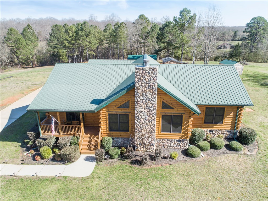 442 Old River Road Pelzer, SC 29669 - Photo 2 of 46 Front porch, stone fireplace, 4+acres