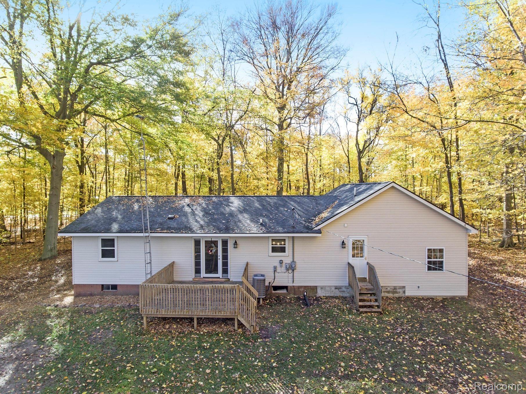 11750 Chase Lake Road Webberville, MI 48892 - Photo 6 of 22 Rear deck for entertaining
