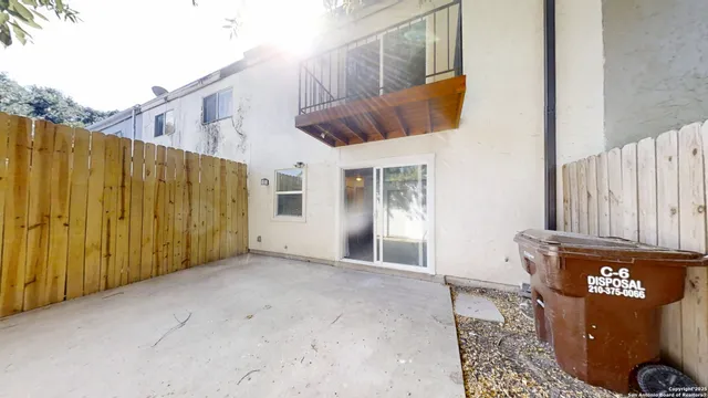 a view of a back yard of the house