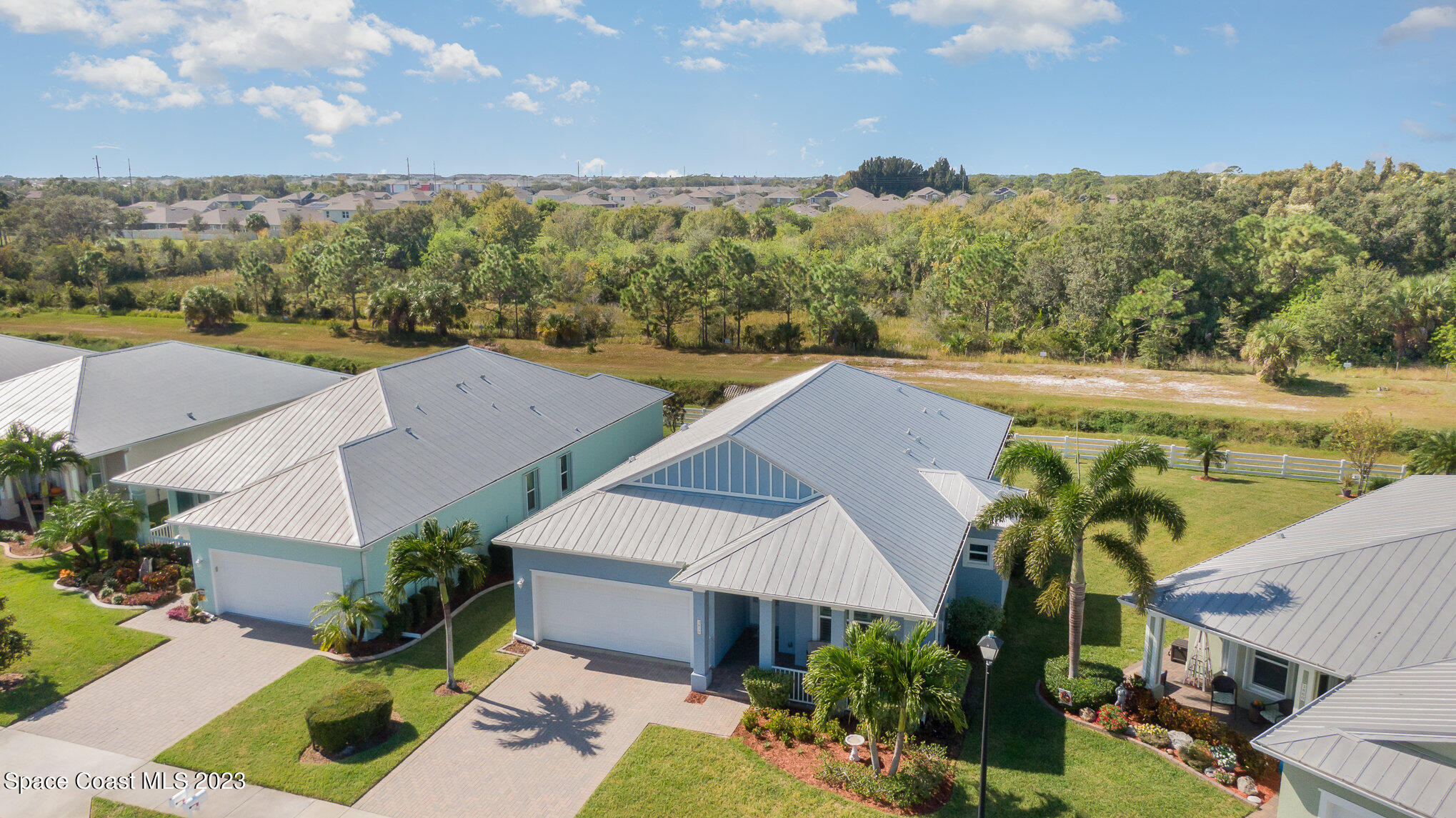 3850 Alamanda Key Drive Melbourne, FL 32901 - Photo 22 of 44 an aerial view of a house with a garden