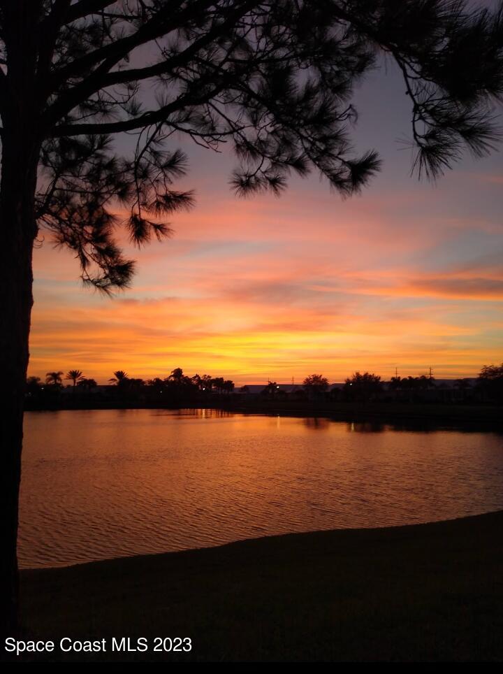 3850 Alamanda Key Drive Melbourne, FL 32901 - Photo 38 of 44 a view of lake from sunset