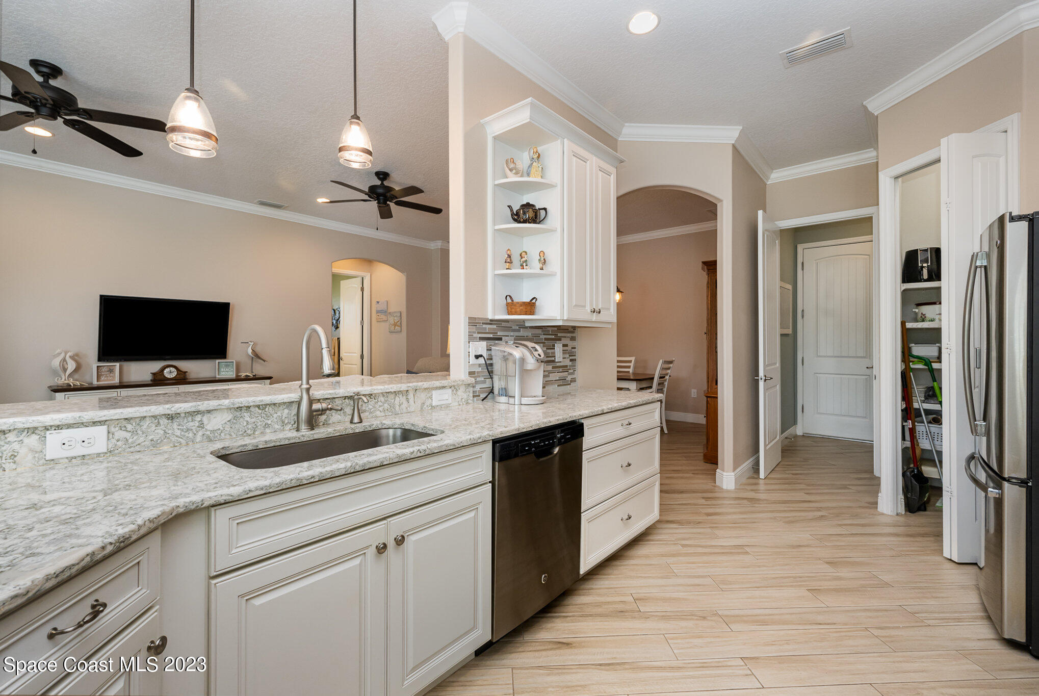 3850 Alamanda Key Drive Melbourne, FL 32901 - Photo 5 of 44 a spacious bathroom with a granite countertop sink double vanity and a mirror