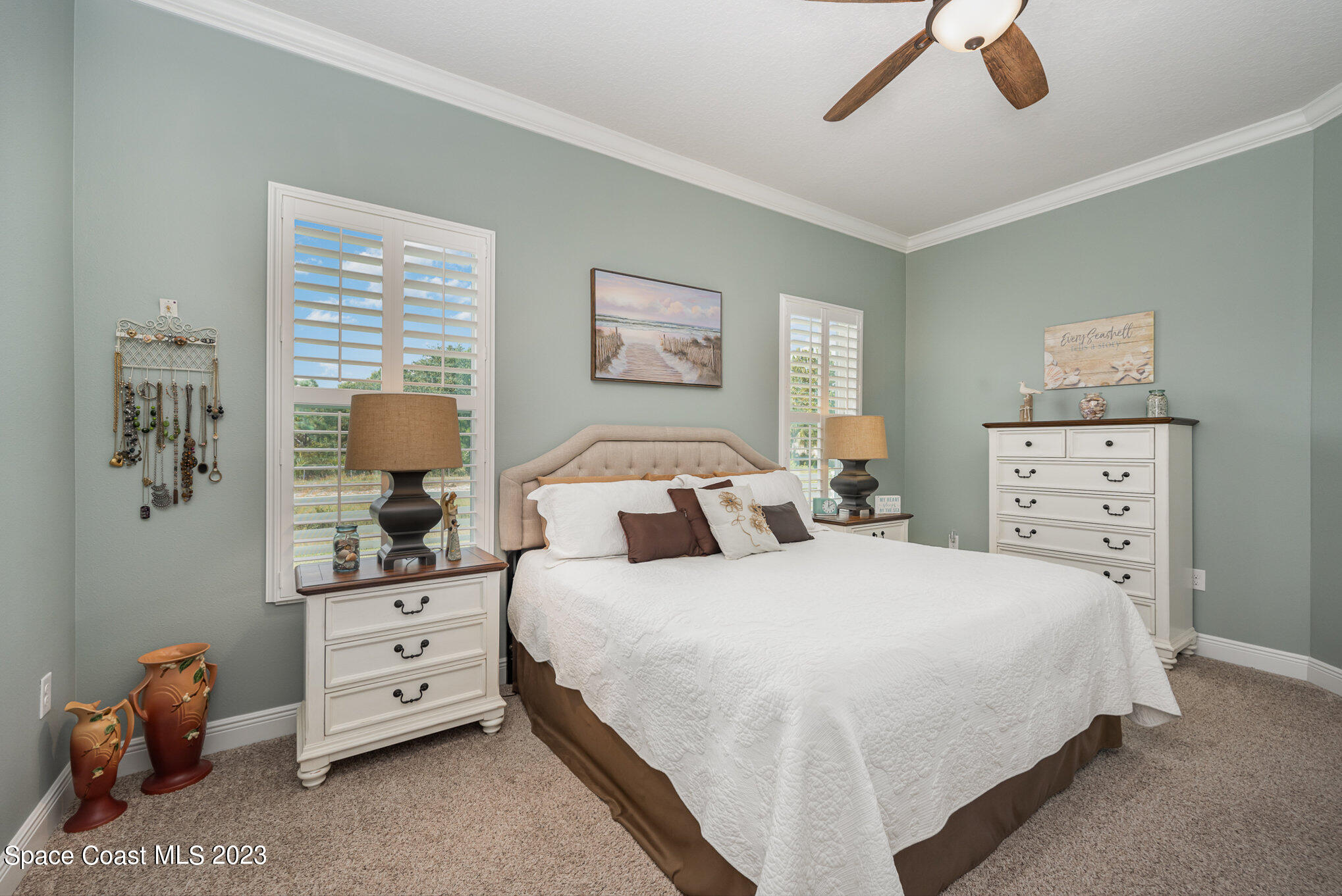 3850 Alamanda Key Drive Melbourne, FL 32901 - Photo 9 of 44 a bedroom with a bed and a window