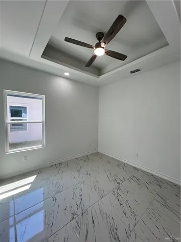 en empty room with windows