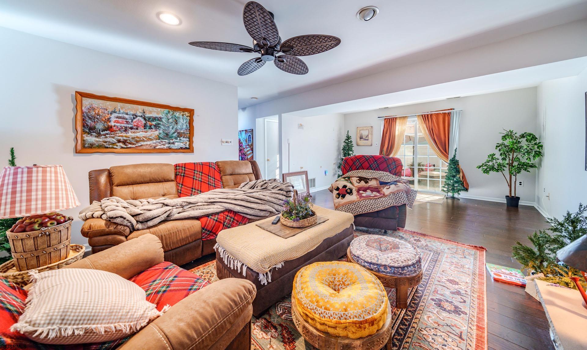 68 Defeo Lane Somers Point, NJ 08244 - Photo 26 of 51 a living room with furniture and a large window