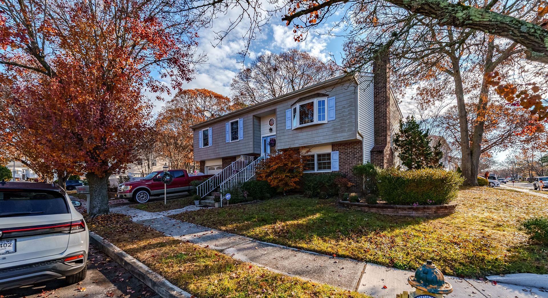 68 Defeo Lane Somers Point, NJ 08244 - Photo 3 of 51 a front view of a house with garden
