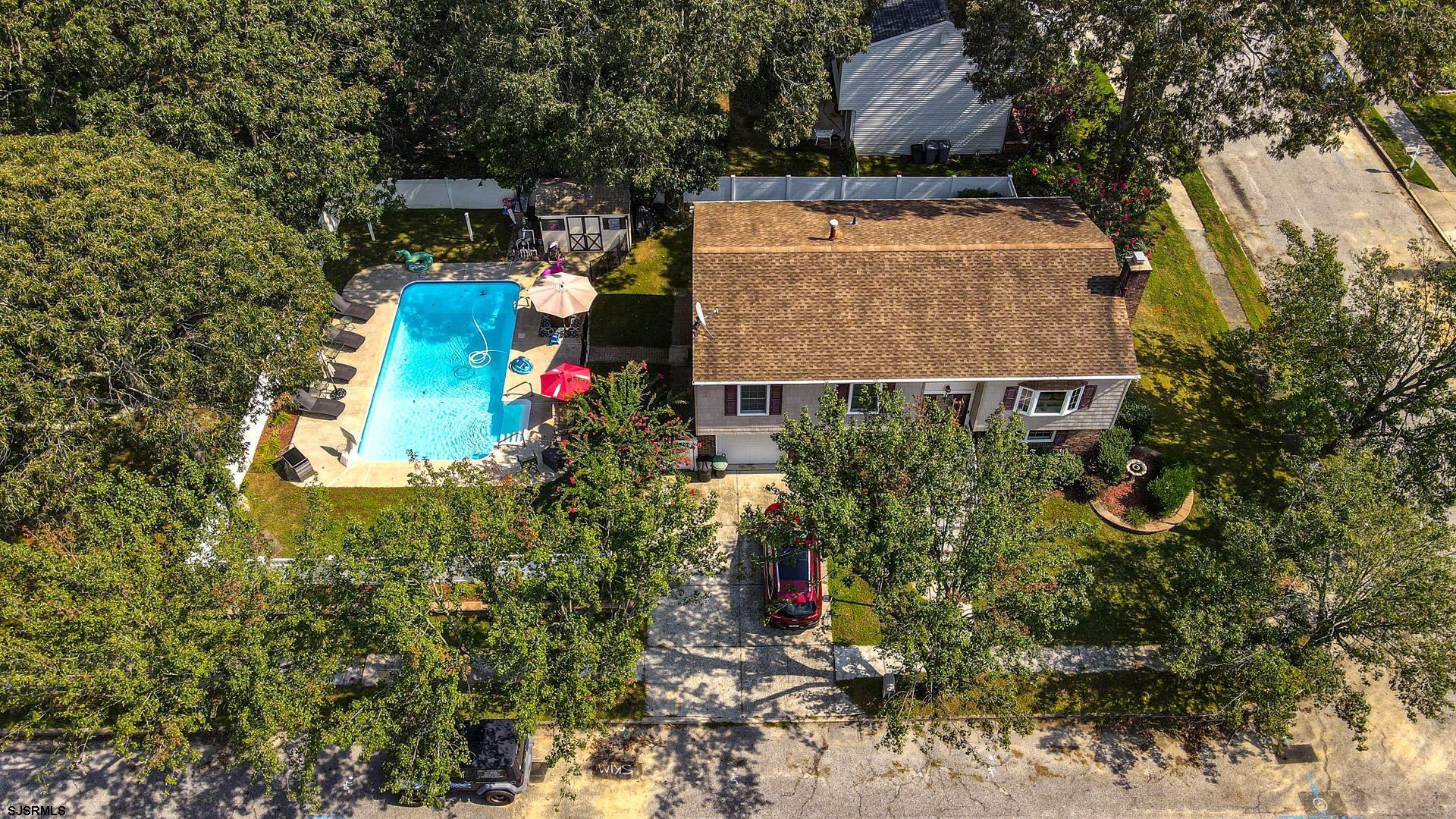 68 Defeo Lane Somers Point, NJ 08244 - Photo 34 of 51 an aerial view of residential house with outdoor space and trees all around