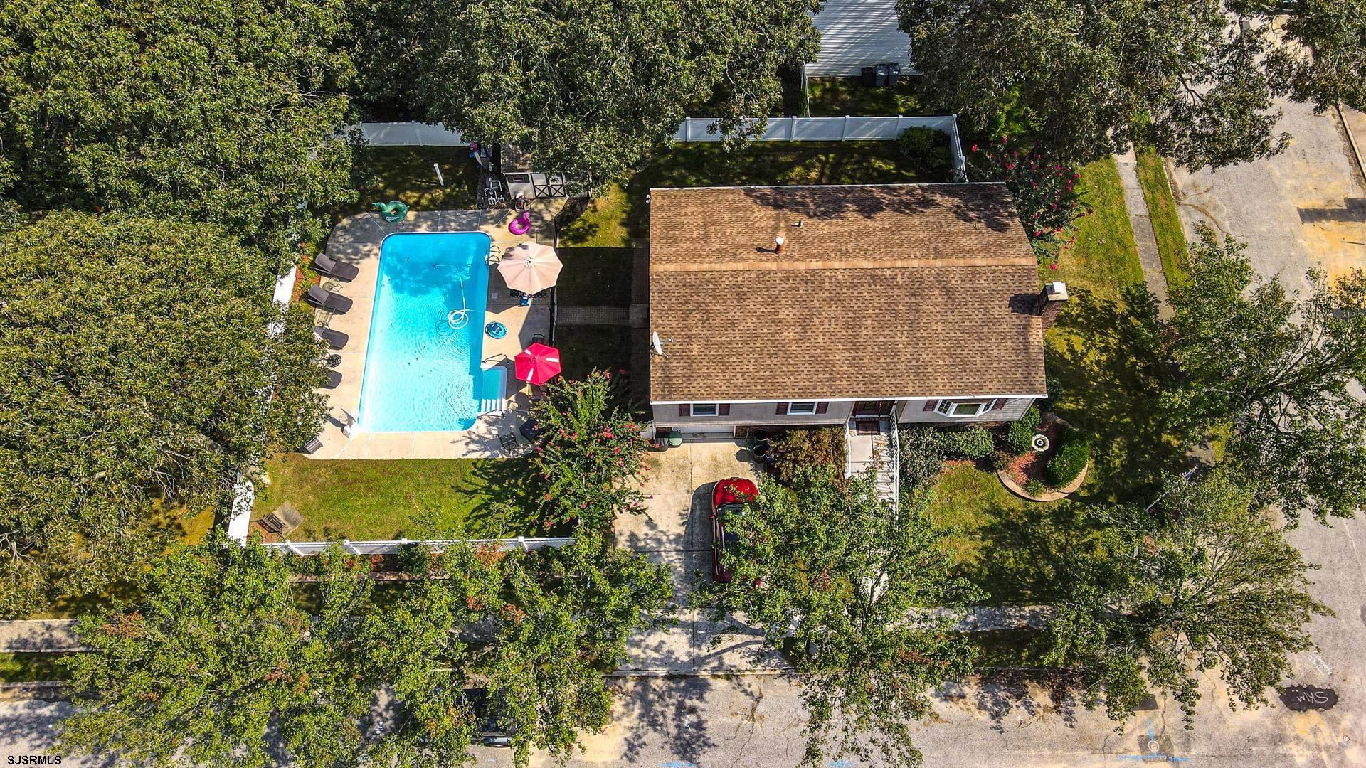 68 Defeo Lane Somers Point, NJ 08244 - Photo 35 of 51 an aerial view of a house with yard swimming pool and outdoor seating