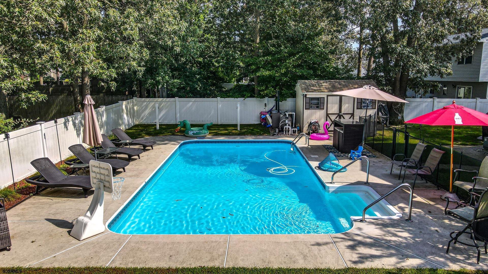 68 Defeo Lane Somers Point, NJ 08244 - Photo 43 of 51 a backyard of a house with yard and outdoor seating