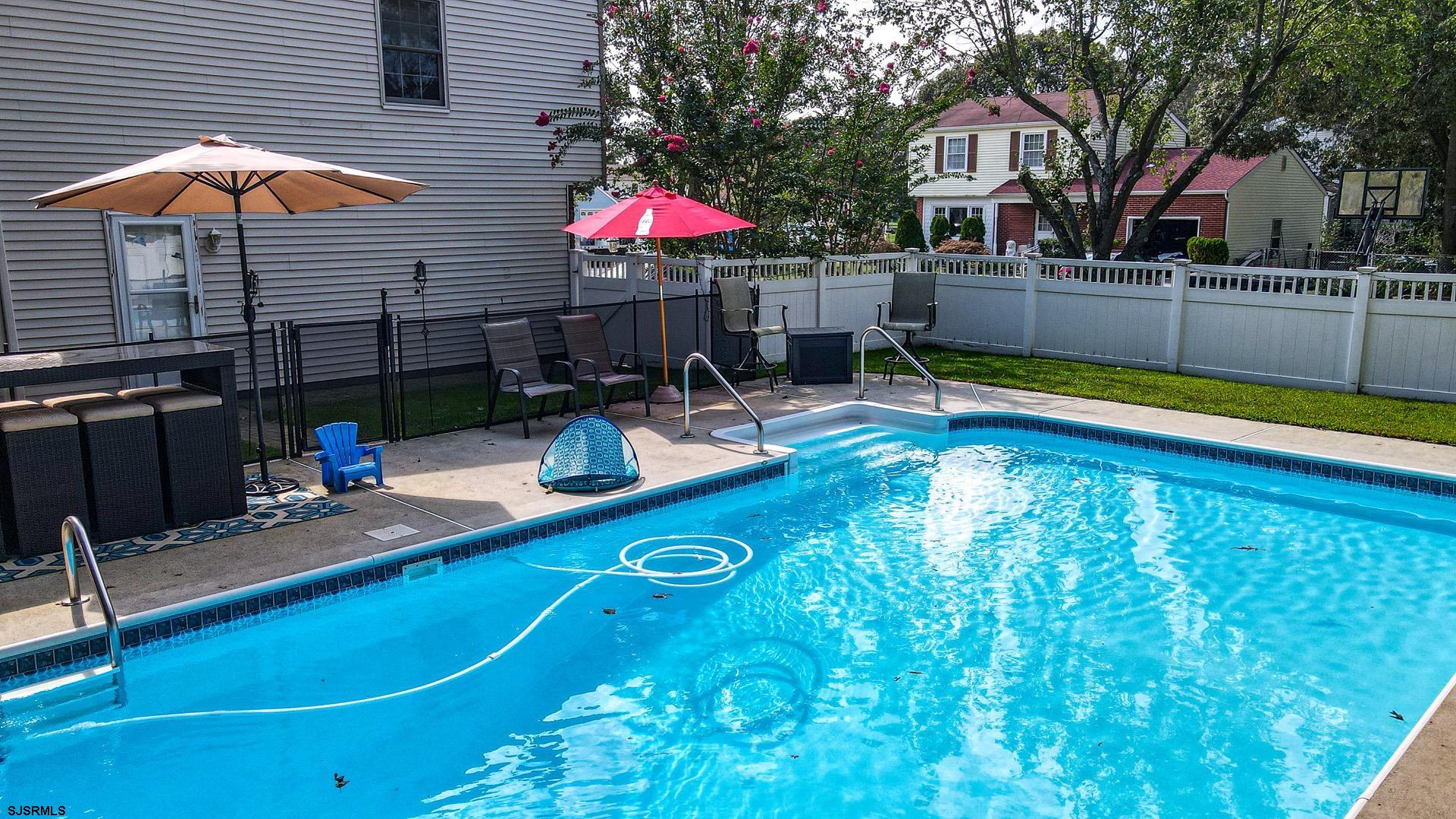 68 Defeo Lane Somers Point, NJ 08244 - Photo 45 of 51 a view of a swimming pool with a patio