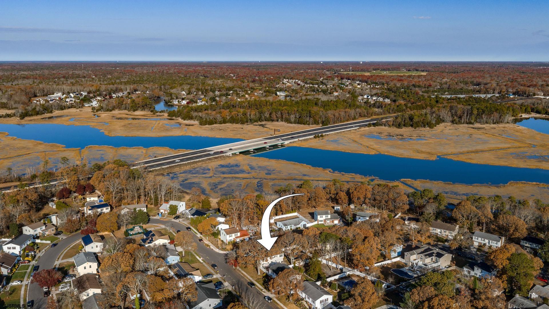 68 Defeo Lane Somers Point, NJ 08244 - Photo 49 of 51 a view of a city with an ocean